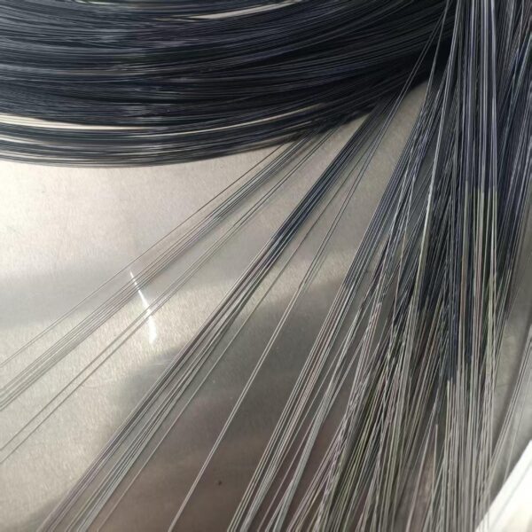 Nitinol guide wire with hydrophilic tip navigating blood vessel